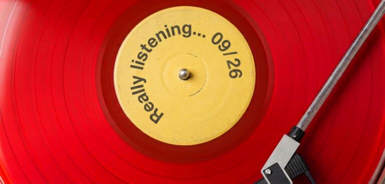 A vinyl record on turntable with label 'Really listening - 09/26'